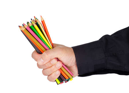 Man holding lots of coloring pencilsの写真素材
