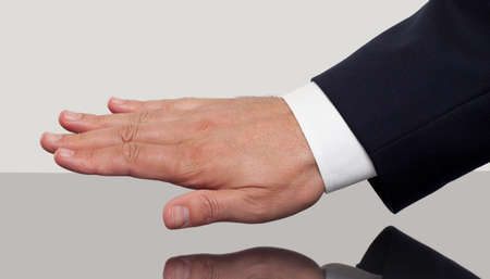 Close up of a man's hand showing his nailsの写真素材