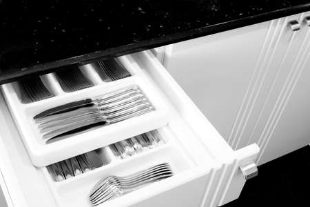 Silverware in kitchen drawerの写真素材