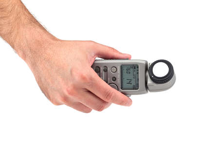 Hand holding a light meter