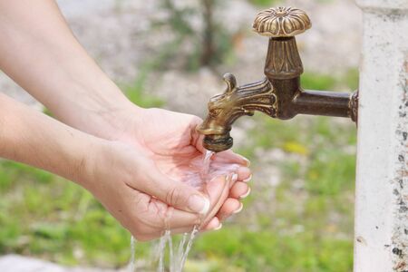Water collected in your handsの写真素材