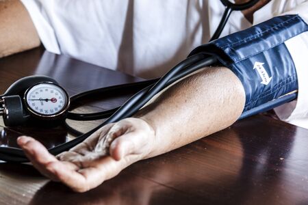 Checking blood pressureの写真素材