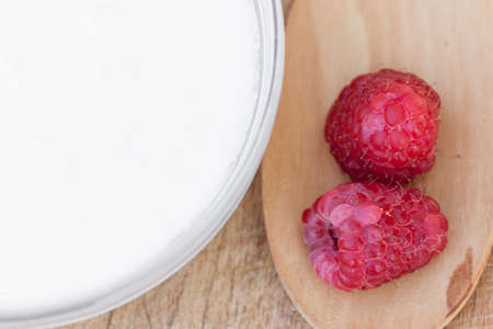 Yogurt and raspberriesの写真素材