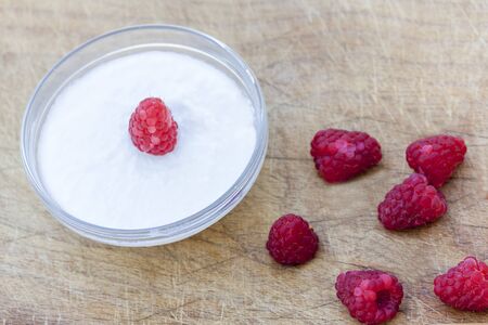 Yogurt and raspberries