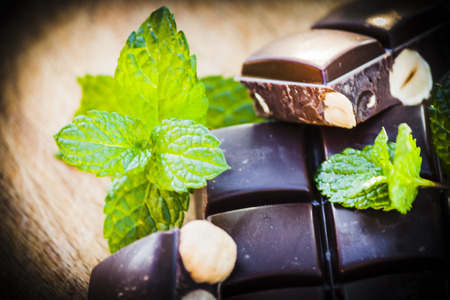 Chocolate with nuts and fresh mintの写真素材