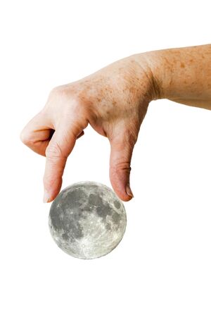 Hand picking the moonの写真素材