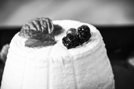 Ricotta cheese with berries and fresh mintの写真素材