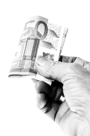 Hand of a woman holding moneyの写真素材