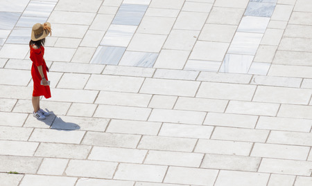 Tourist standing in the amphitheater of Ephesusの写真素材