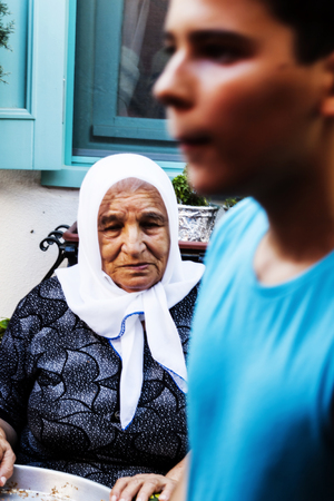 Old turkish woman and young boyのeditorial素材