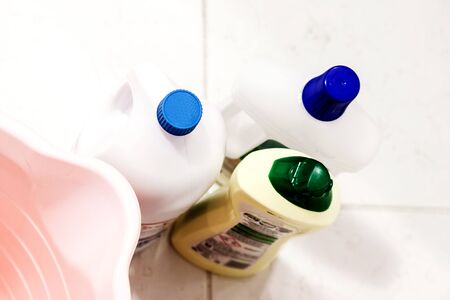 Detergent bottles on the floor