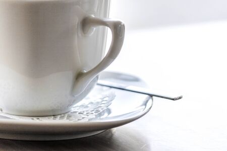 Ceramic cup of coffee on the tableの写真素材