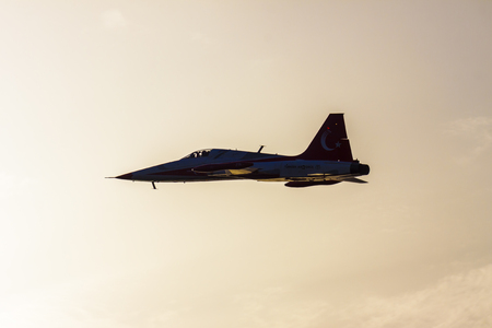 Turkish military acrobatic airplane in backlightのeditorial素材