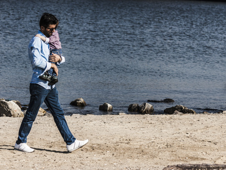 Father and child son at seasideのeditorial素材