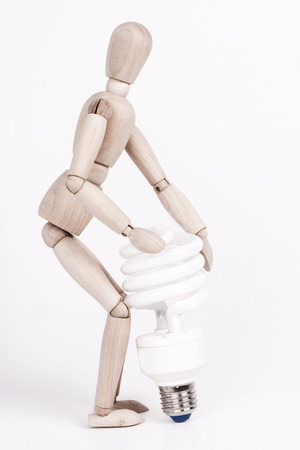 Puppet with the energy saving lampの写真素材