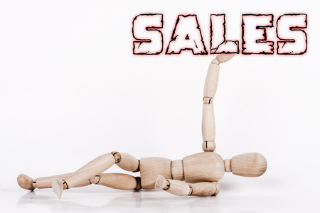 Puppet laying at ground, with its right arm upの写真素材