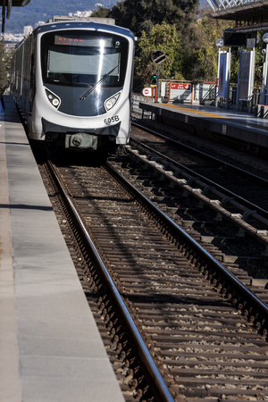 Subway train of the city of Izmir (Turkey) coming to the station .のeditorial素材