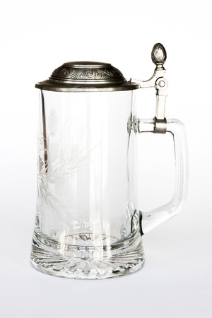 Vintage beer glass with metallic cover on white background - photoの写真素材