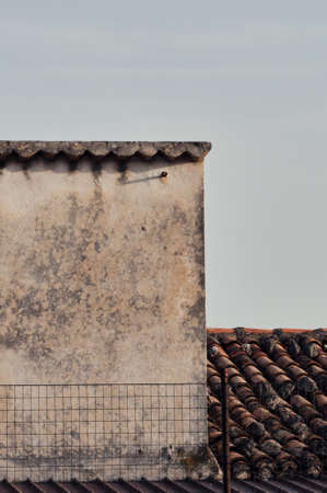 geometry brick wall house roof tiles skyの写真素材