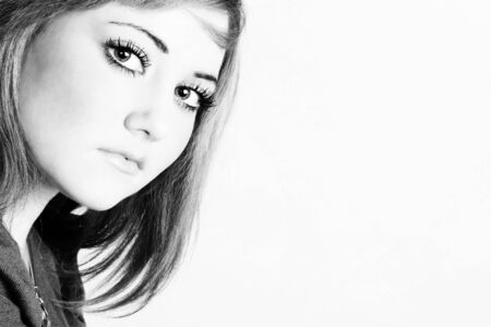 Beautiful young model with striking green eyesの写真素材