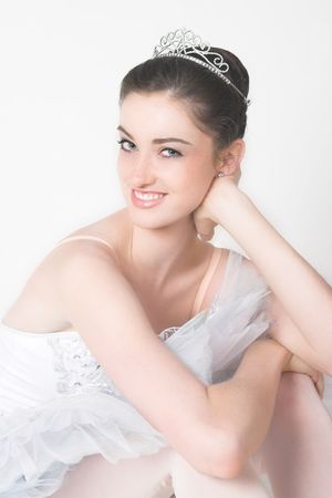 Sweet expression of a young ballerina wearing a tiaraの写真素材