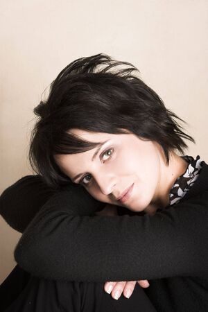 Studio shot of female brunette, head and shouldersの写真素材