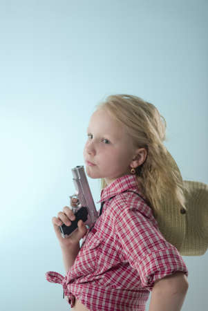 cowgirl with a gunの写真素材