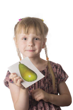 little serious girl with cardboard cart on white isolated backgroundの写真素材