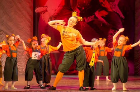 MINSK, BELARUS FEBRUARY 17: unidentified dancers from "VINT-KLAB Dancing school" participate with "Red Ap " dance in "Global Dance" competitions in choreography ,17 February 2014 in Minsk, Belarus.のeditorial素材