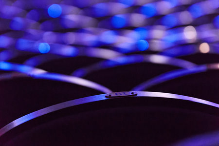 Illuminated Concert Hall Seating in Vibrant Blues