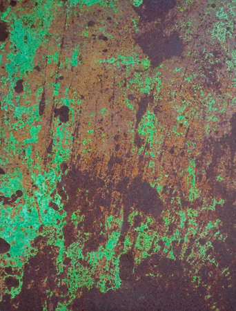 Emerald green colorful texture, could be used as a dramatic background, for a rustic, aged effect or to accentuate the decay. It also has a chipped paint effect close up.の写真素材