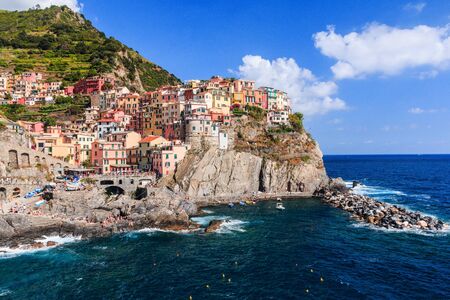 Manarola, Cinque Terre, Italy. View of Manarola on a sunny day.の写真素材