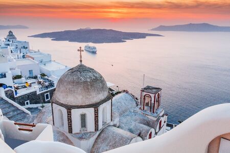 Santorini, Greece. View of Thira town at sunset.の写真素材