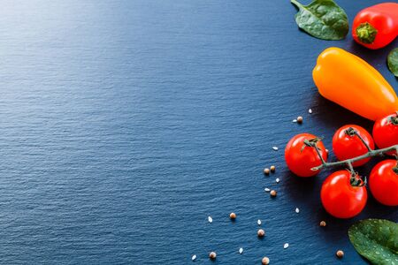 Fresh vegetables and spices from above with negative space for text and graphics.の写真素材