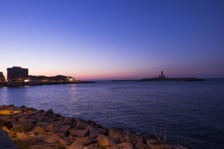 Sunset is in Vieste, Puglia, Italyの写真素材