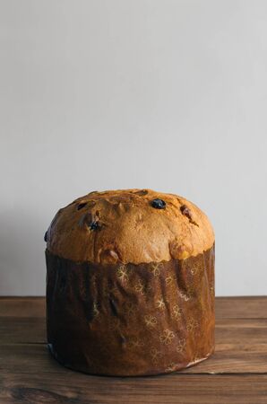 Christmas cake panettone with copy space on wooden backgroundの写真素材