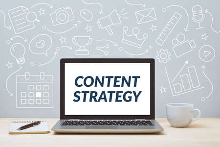 Content strategy text on laptop screen with icon diagram background. Content marketing concept.の写真素材