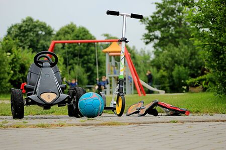 Toys and sports equipment on the Playground in the Parkの写真素材