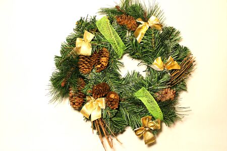 Christmas decoration cones, tree branches and bowsの写真素材