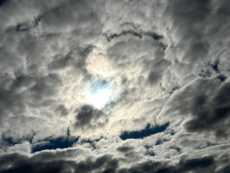 Cloudscape has been developing in gorgeous form. The sun is shining through the clouds.の写真素材