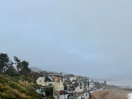 A view of the seafront on a foggy day in Lyme Regis Dorset Englandの写真素材