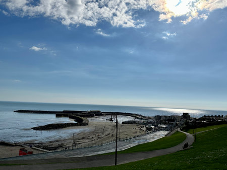 A view of the beach and the promenade in lyme Regis Dorset UK