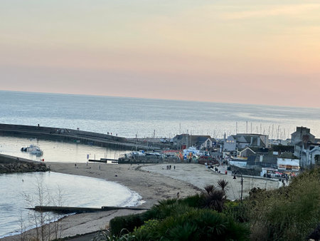 Sunset on the beach of  Lyme Regis dorset England, UKの写真素材