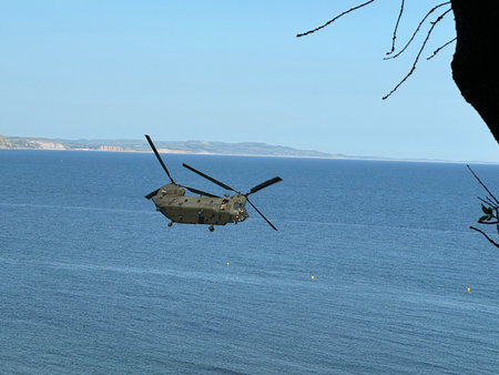Helicopter flying over the  Seaの写真素材