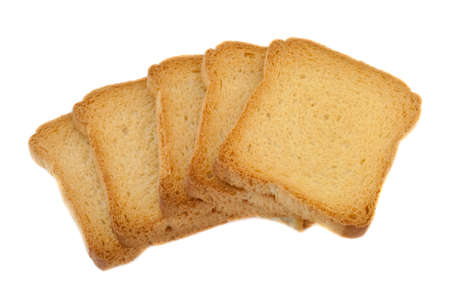 still life of golden rusk in a white backgroundの写真素材