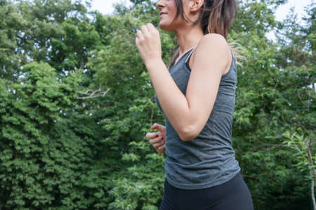 female athlete running on camaldoli parkの写真素材