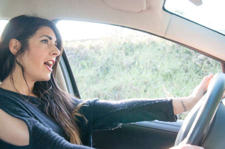 female driver that drive his car in a bad situation