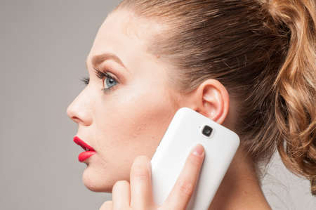 girl listen on the phoneの写真素材