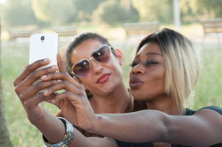 happy girl on the phoneの写真素材