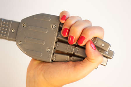 girl and robot handshake